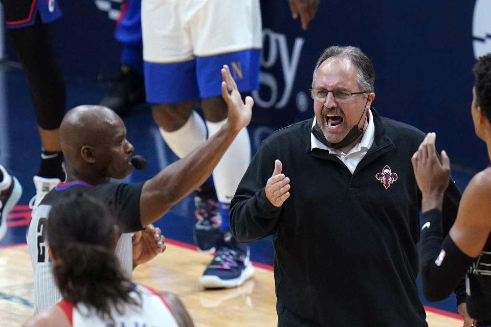 New Orleans Pelicans coach Stan Van Gundy challenges referee Dedric Taylor on a timeout call in the second half of the team's NBA basketball game against the Philadelphia 76ers in New Orleans, Friday, April 9, 2021. (AP Photo/Gerald Herbert)