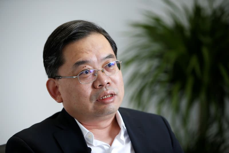 Yin Jihui, director of the Tianjin Industry and Information Technology Bureau, speaks during an interview with Reuters in Tianjin