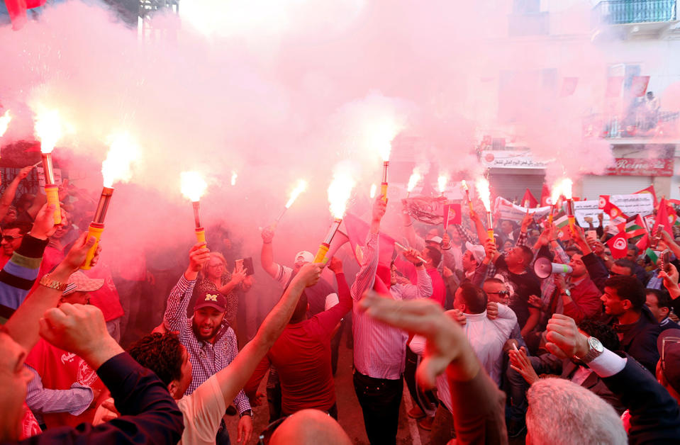 Union members holding flares