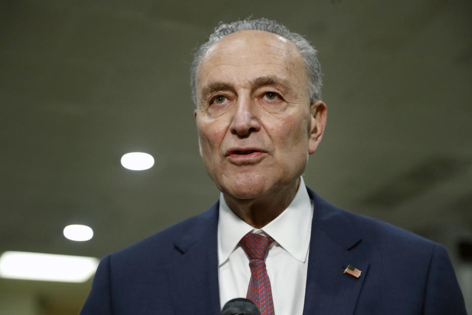 Senate Minority Leader Sen. Chuck Schumer, D-N.Y., talks to reporters at the U.S. Capitol in Washington, Friday, Jan. 31, 2020, during the impeachment trial of President Donald Trump on charges of abuse of power and obstruction of Congress. (AP Photo/Julio Cortez)