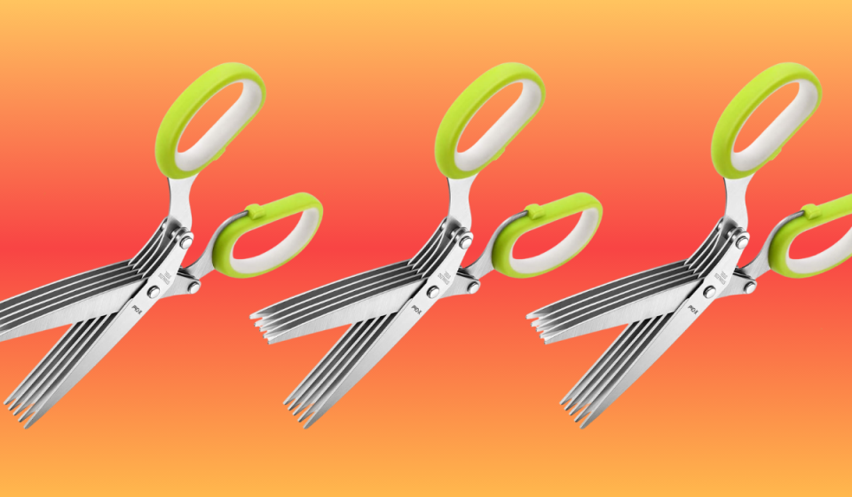 three pairs of green herb scissors on an orange and red background