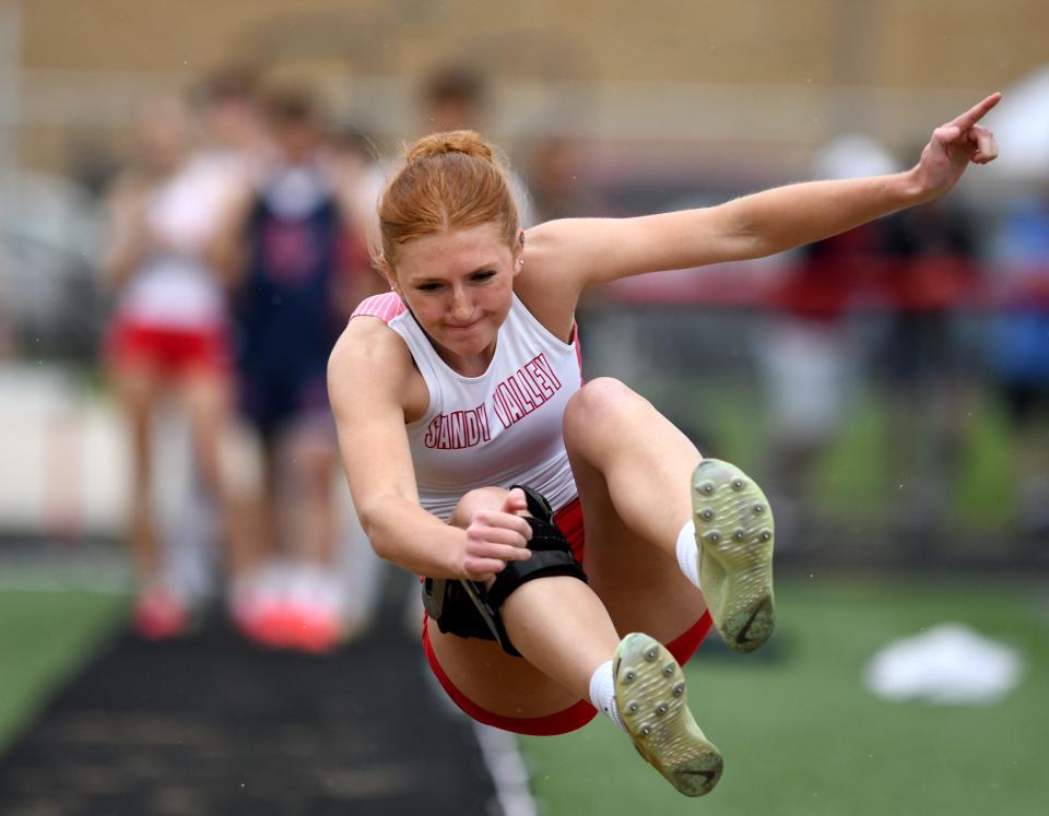 Sandy Valley's Lexi Tucci jumps a school-record 18 feet, 1 inch in the girls long jump during a quad meet last week.