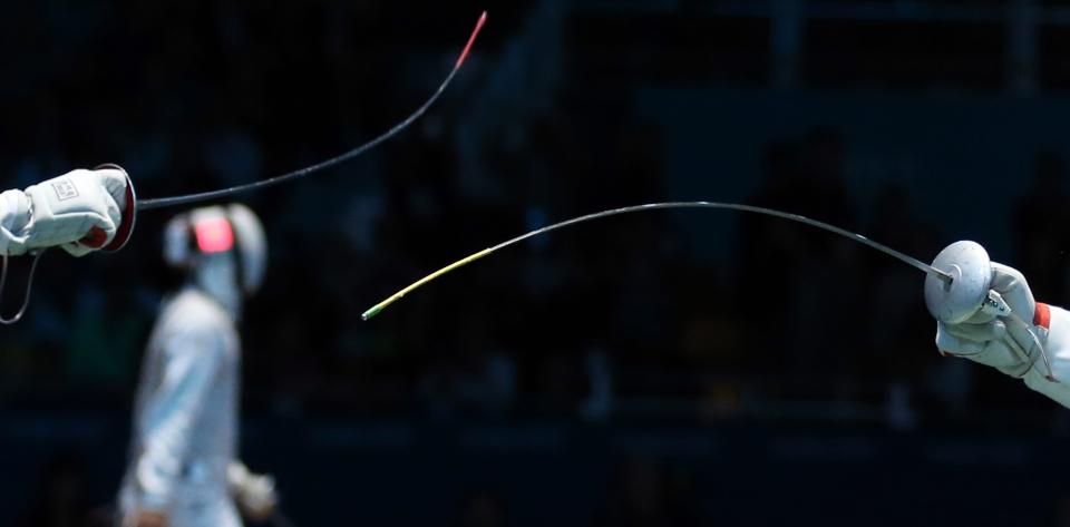 The foils of Germany's fencer Benjamin Kleibrink (R) and Renal Ganeev (L) of Russia during men's foil team quarter final in ExCeL Arena at the London 2012 Olympic Games, London, Britain, 05 August 2012. EPA/Friso Gentsch