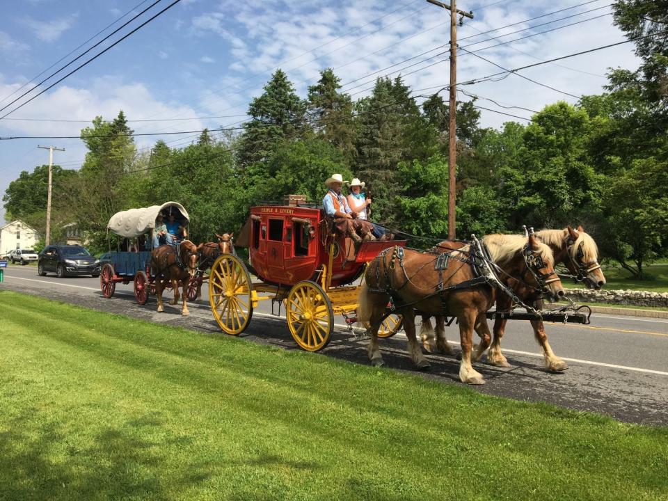 The James Shaull Wagon Train makes its way east on U.S. 40, near Spickler Road east of Clear Spring, on May 18, 2019.