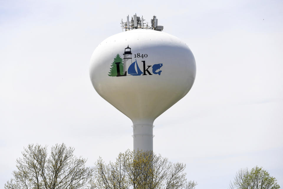 A Lake County water tower is shown on Tuesday, May 10, 2022, in Wickliffe, Ohio. How much money should CVS, Walgreens and Walmart pharmacies pay two Ohio counties in damages to help them ease the effects of the opioid crisis? That's the question in front of a federal judge in Cleveland, who will begin hearing testimony on Tuesday after a jury found the three giant pharmacy chains responsible last fall for recklessly distributing massive amounts of pain pills in Lake and Trumbull counties (AP Photo/Nick Cammett)