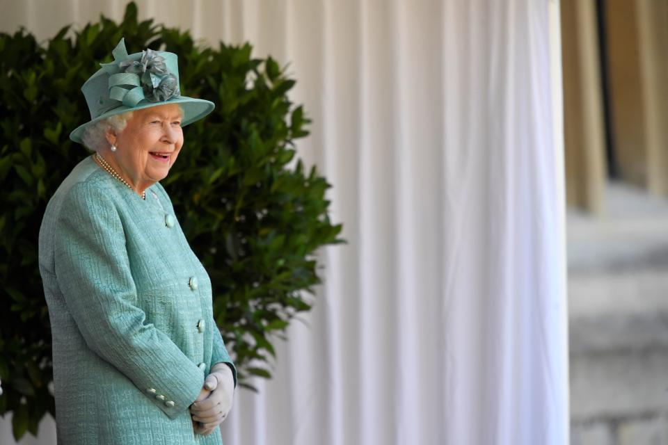 Britain's Queen Elizabeth II attends a ceremony to mark her official birthday at Windsor Castle in Windsor, southeast England on June 13, 2020, as Britain's Queen Elizabeth II celebrates her 94th birthday this year. (Photo by TOBY MELVILLE / POOL / AFP) (Photo by TOBY MELVILLE/POOL/AFP via Getty Images)