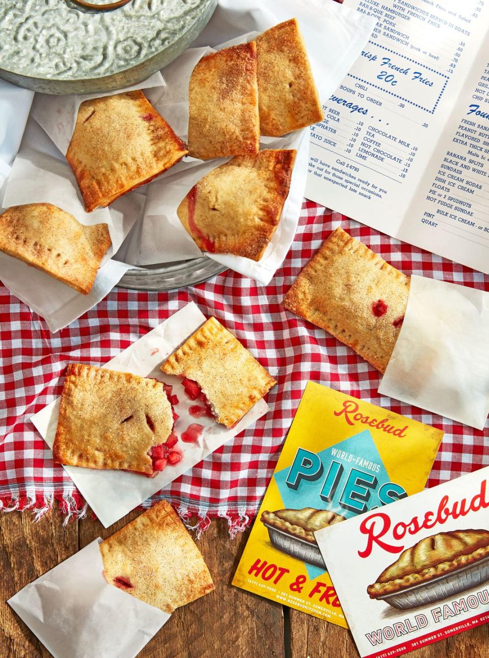 cranberry apple hand pies on a red checkered tablecloth