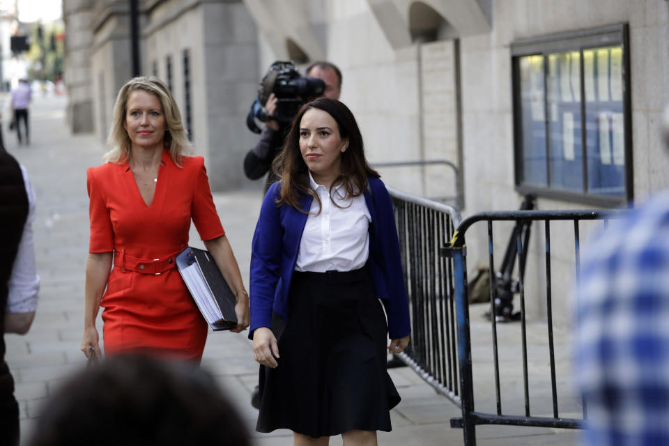 Stella Moris, right, the partner of WikiLeaks founder Julian Assange, and his lawyer Jennifer Robinson, left, arrive at the Central Criminal Court, the Old Bailey, in London, Monday, Sept. 14, 2020. The London court hearing on WikiLeaks founder Julian Assange's extradition from Britain to the United States resumed Monday after a COVID-19 test on one of the participating lawyers came back negative, WikiLeaks said Friday, (AP Photo/Matt Dunham)