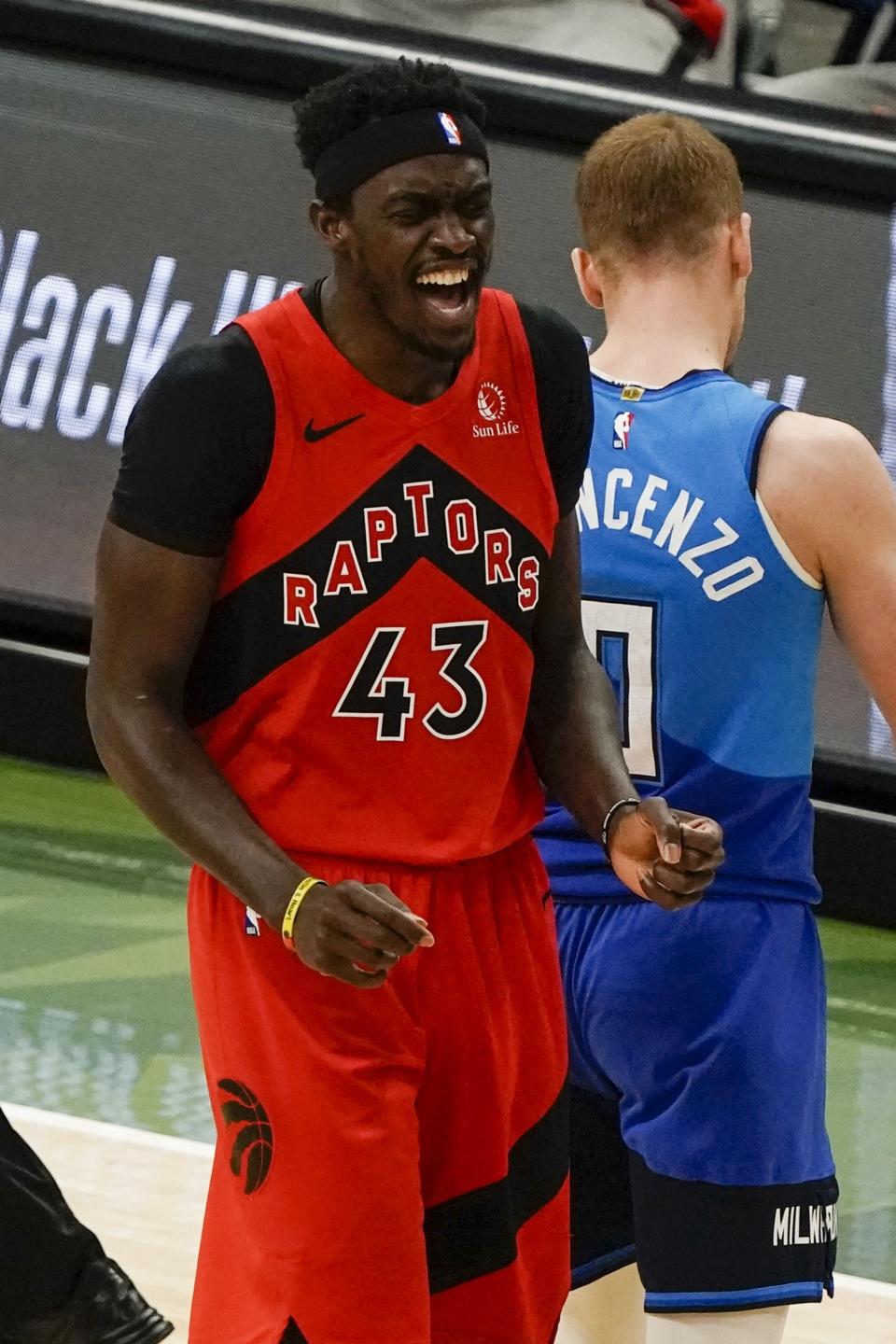 Toronto Raptors' Pascal Siakam reacts after making a basket and being fouled during the first half of an NBA basketball game against the Milwaukee Bucks Thursday, Feb. 18, 2021, in Milwaukee. (AP Photo/Morry Gash)