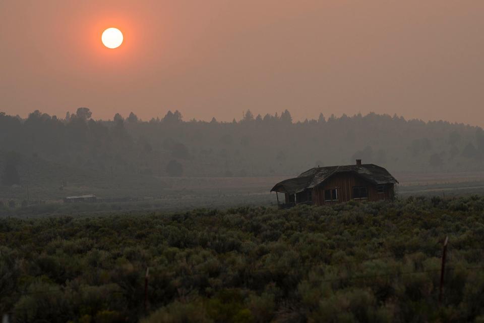 Smoke fills the air near the Bootleg Fire, Tuesday, July 13, 2021, near Sprague River, Ore.