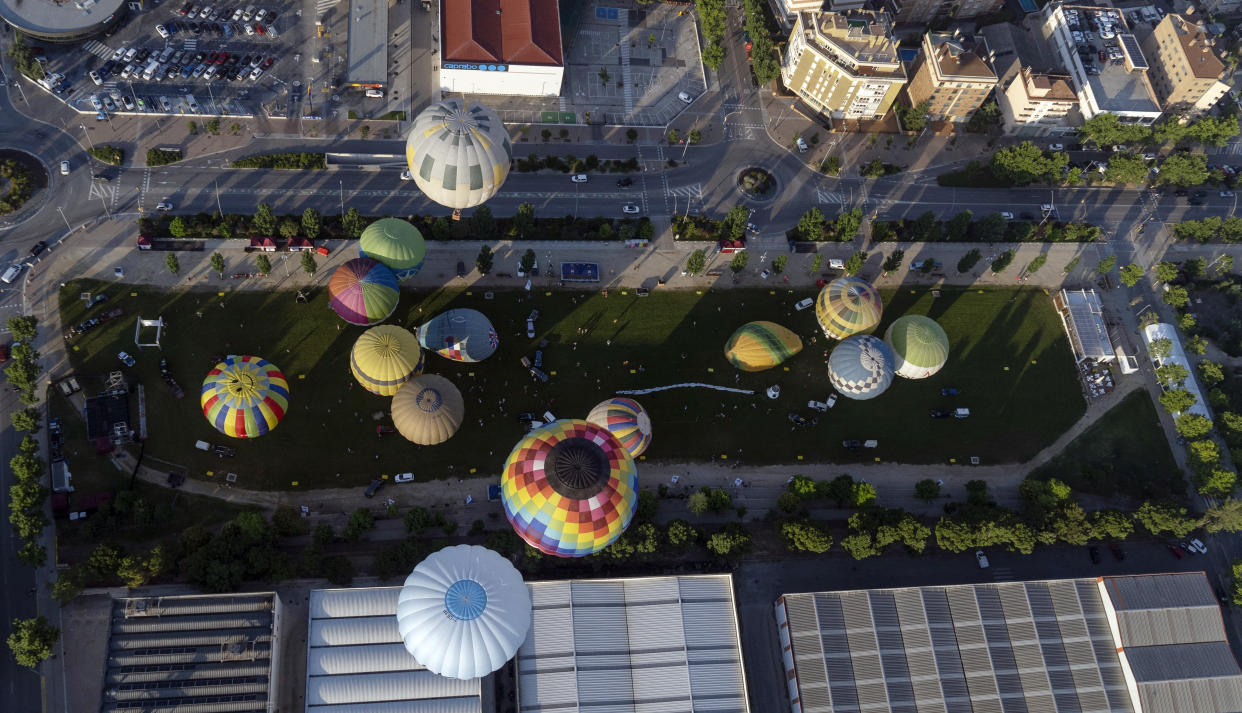 Hot-air balloons float over Igualada on July 11.