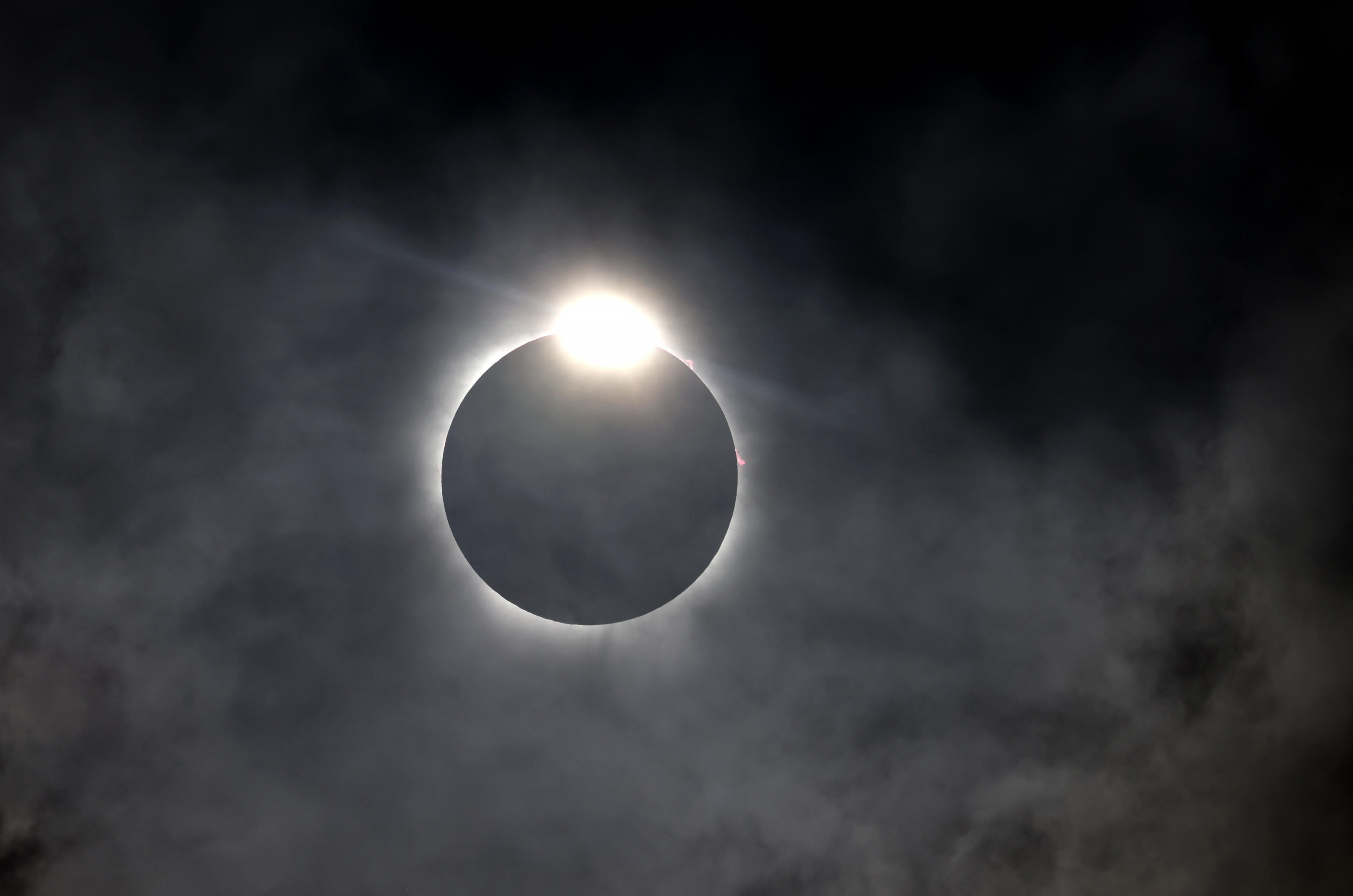 The diamond ring effect is seen as the moon eclipses the sun in Fort Worth, Texas, on Monday. 