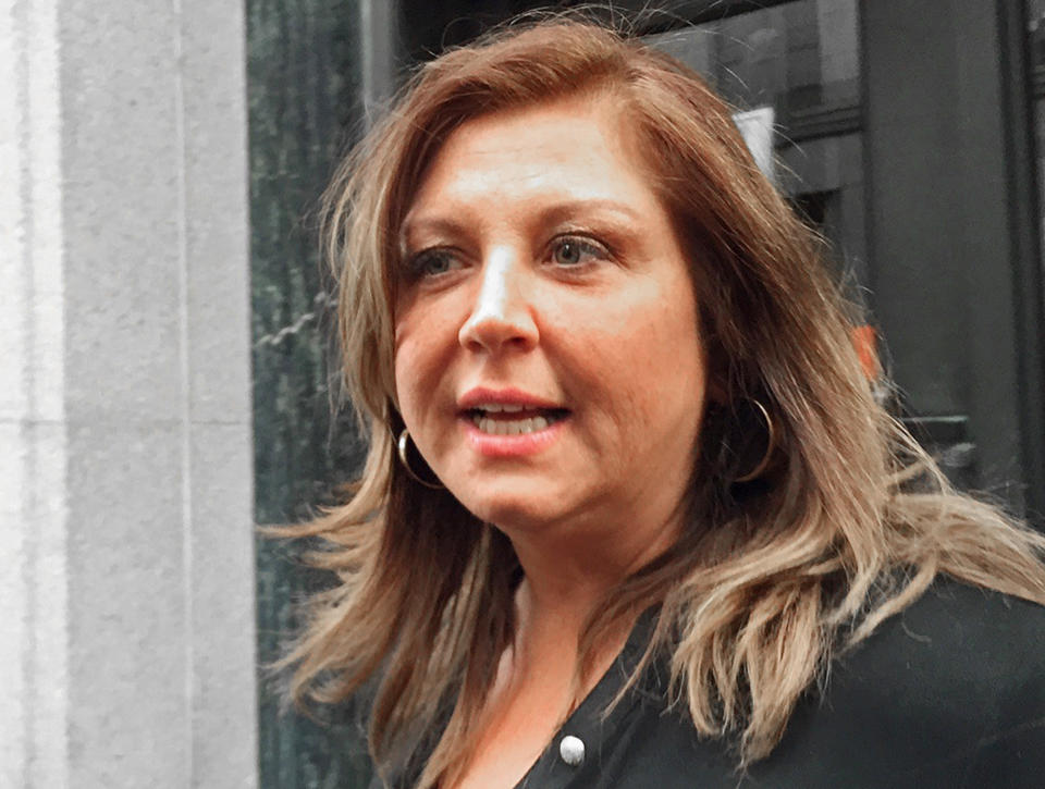 Reality TV show star Abby Lee Miller leaves at the federal courthouse after pleading not guilty to federal charges in Pittsburgh, Pennsylvania November 2, 2015.  Miller pleaded not guilty in a Pennsylvania courthouse on Monday to concealing over $755,000 in income she is accused of earning while head instructor on "Dance Moms" and spinoff shows.  REUTERS/Elizabeth Daley