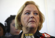 FILE - In this July 25, 2018 file photo, Alameda County District Attorney Nancy O'Malley speaks to reporters outside a courtroom in Oakland, Calif. O'Malley has told a judge she will no longer consider plea deals for the two men charged with 36 counts of involuntary manslaughter for their role in a 2016 warehouse fire that killed three dozen people attending an unlicensed concert. The Associated Press obtained a copy of the letter Thursday, Aug. 16, 2018, a day before the two men are scheduled to return to court. (AP Photo/Ben Margot, File)