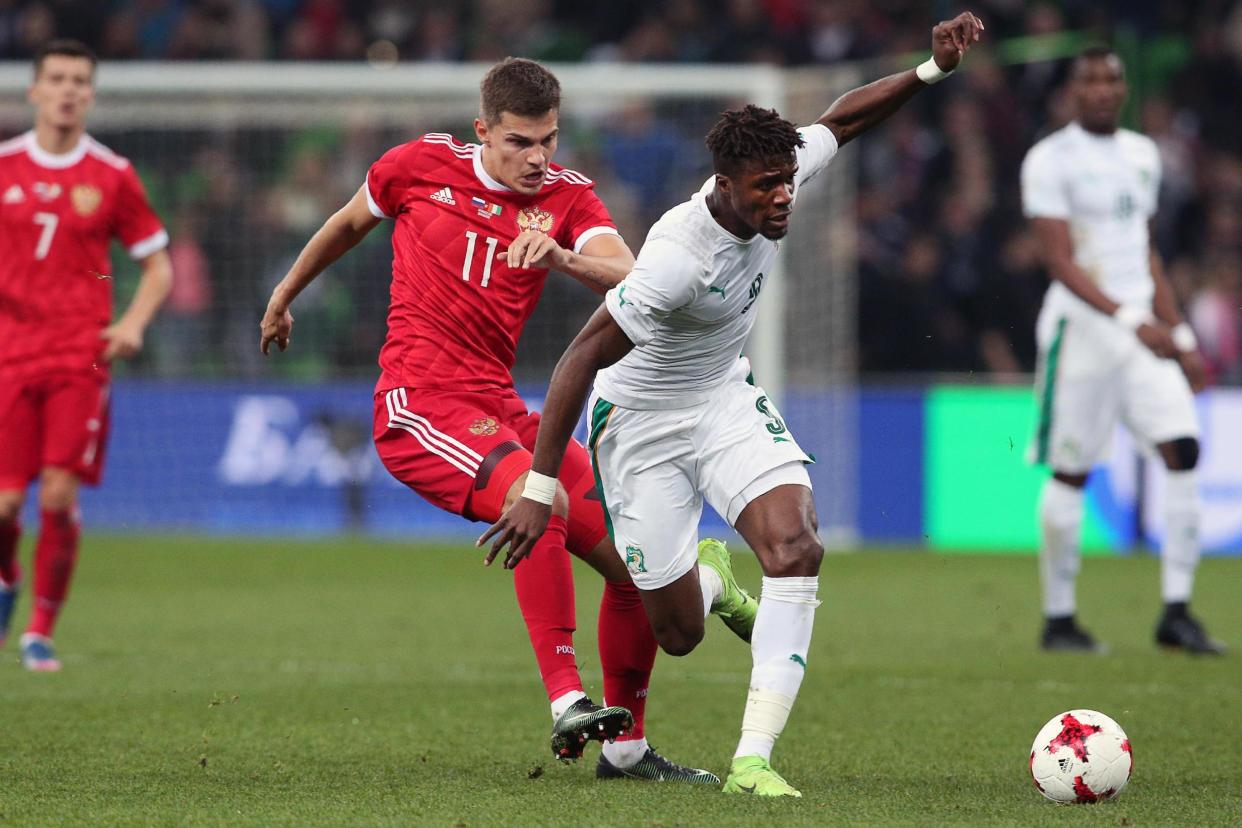 Zaha breezes past a Russian defender in Krasnodar: AFP/Getty Images