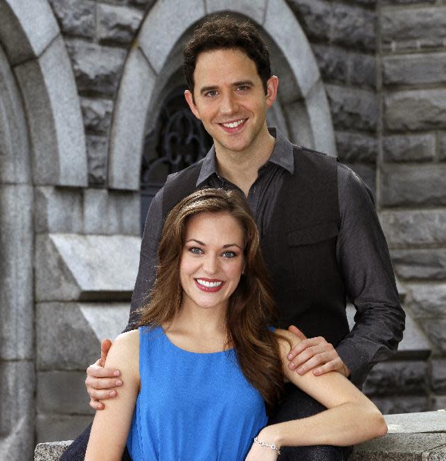 This undated image released by Sam Rudy Media Relations shows actors Laura Osnes and Santino Fontana in New York. Osnes and Fontana will star in the Rodgers and Hammerstein's "Cinderella." (AP Photo/Sam Rudy Media Relations, Carol Rosegg)