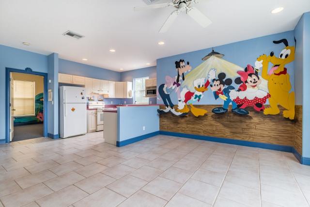 Disney Lovers' Florida House with Two Mickey Mouse–Shaped Pools Hits the  Market for $850K
