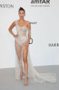 <p>Championing the sheer trend, Bella Hadid opted for a bejewelled one-shoulder gown by Ralph and Russo at the amFAR Gala during the Cannes Film Festival.<br><br>The model finished the look with a sleek topknot and minimal makeup. Because when you have a tulle train like that, what more do you need? <em>[Photo: Getty]</em> </p>