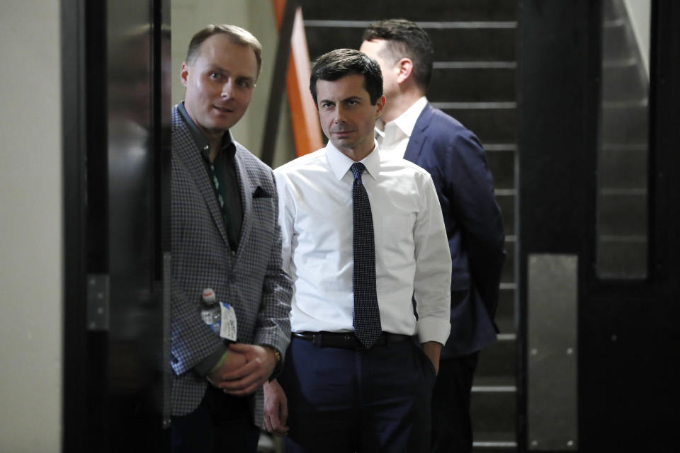 Democratic presidential candidate South Bend, Ind., Mayor Pete Buttigieg waits backstage as he is introduced to speak at the Iowa Farmers Union Presidential Forum, Friday, Dec. 6, 2019, in Grinnell, Iowa. (AP Photo/Charlie Neibergall)