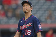 Minnesota Twins starting pitcher Kenta Maeda (18) walks to the dugout in the third inning of a baseball game against the Cleveland Indians, Tuesday, April 27, 2021, in Cleveland. (AP Photo/David Dermer)