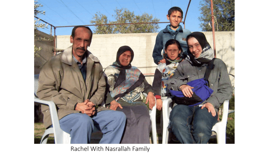 Rachel Corrie, right, with the family of Dr  Samir Nasrallah, left, whose property she died trying to protect (Courtesy Corrie family)