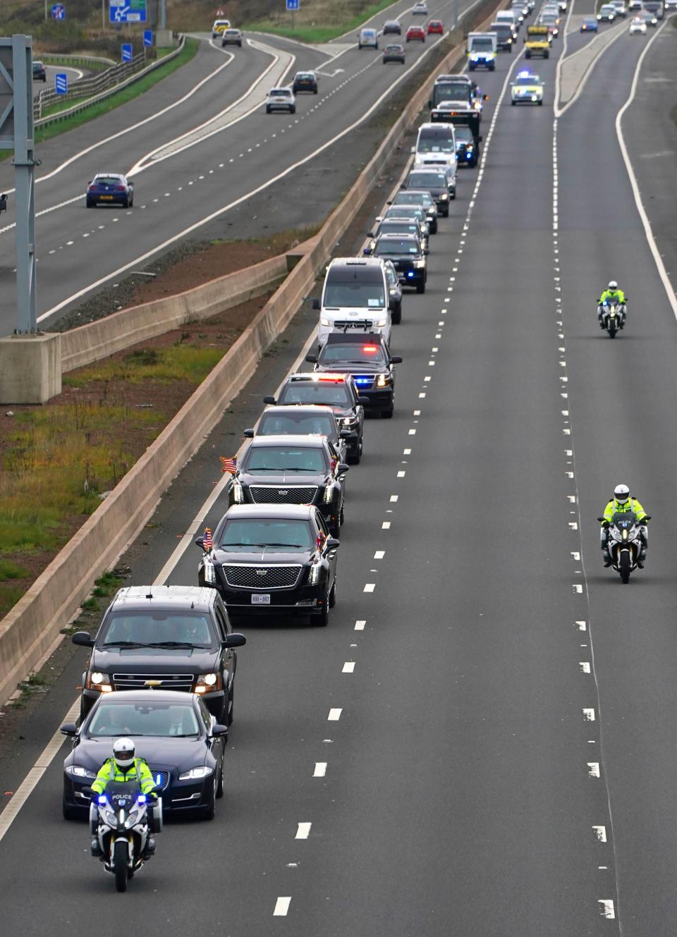 Joe Biden heads along the M8 motorway towards the Cop26 summit in Glasgow (PA)