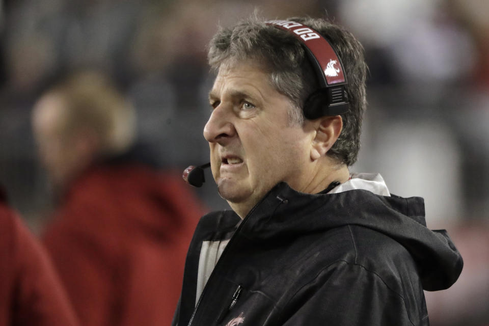 Mike Leach was not in a chipper mood after losing the Apple Cup for the seventh year in a row. (AP Photo/Ted S. Warren)