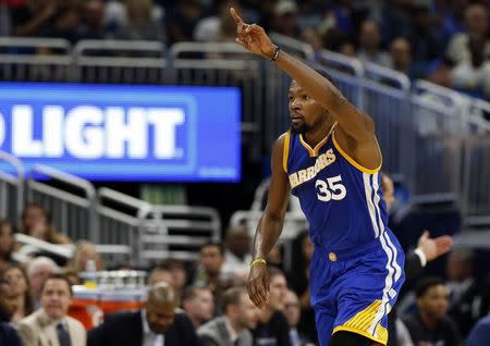 Jan 22, 2017; Orlando, FL, USA;Golden State Warriors forward Kevin Durant (35) reacts after scoring against the Orlando Magic during the second half at Amway Center. Golden State Warriors defeated the Orlando Magic 118-98. Mandatory Credit: Kim Klement-USA TODAY Sports