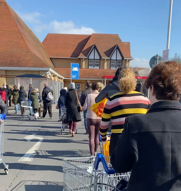 NHS workers queue before their special designated shopping hour at 10am local time at Tesco in Purley, Surrey. Photo: Yahoo Finance UK/Lianna Brinded