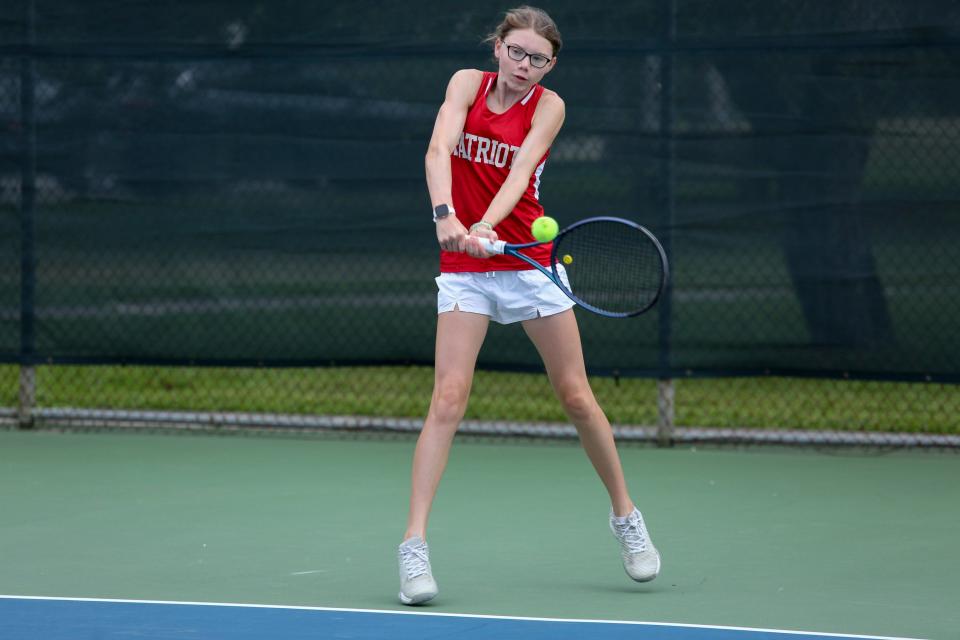 Master's Academy's Addison Trotter returns the ball during a district 8-1A doubles match at Riverside Park on Wednesday, April 12, 2023, in Vero Beach