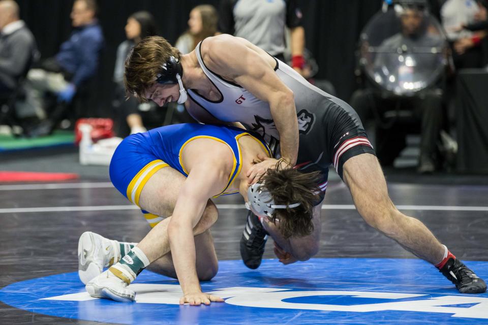 Mar 17, 2023; Tulsa, OK, USA;  Rider wrestler Ethan Laird (right) wrestles Pittsburgh wrestler Nino Bonaccorsi in a 197-pound weight class semifinal match during the NCAA Wrestling Championships at the BOK Center. Mandatory Credit: Brett Rojo-USA TODAY Sports