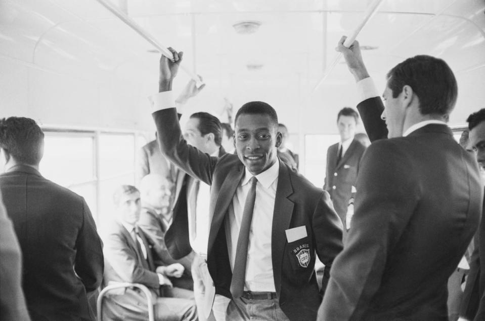 Pele with his teammates of Brazil national football team travelling on a bus upon their arrival in the UK for the 1966 Fifa World Cup, UK, 25th June 1966. (Getty Images)