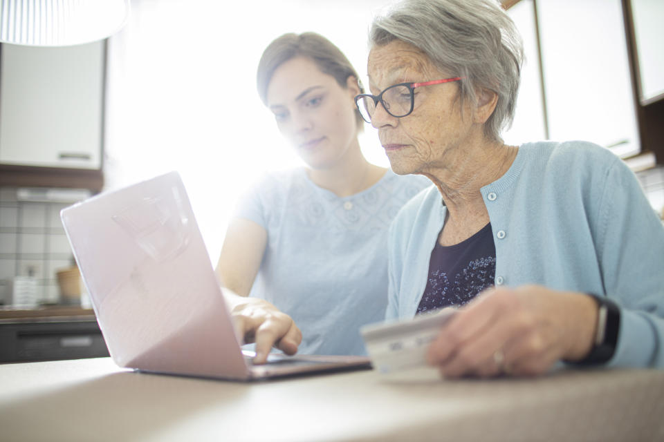 RADEVORMWALD, GERMANY - MAY 12: In this photo illustration two women are looking at a laptop doing online shopping on May 12, 2020 in Radevormwald, Germany. (Photo by Ute Grabowsky/Photothek via Getty Images)