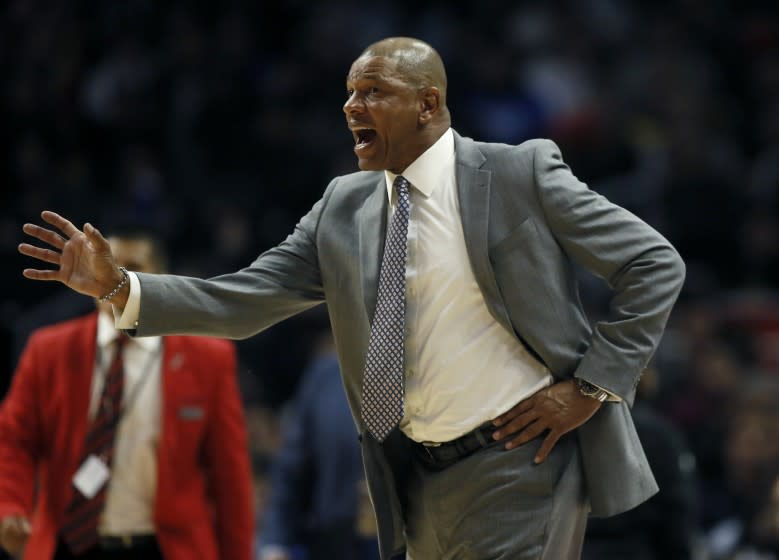 Los Angeles Clippers head coach Doc Rivers yells out during the second half of an NBA basketball game against the Dallas Mavericks in Los Angeles, Monday, Feb. 25, 2019. (AP Photo/Alex Gallardo)