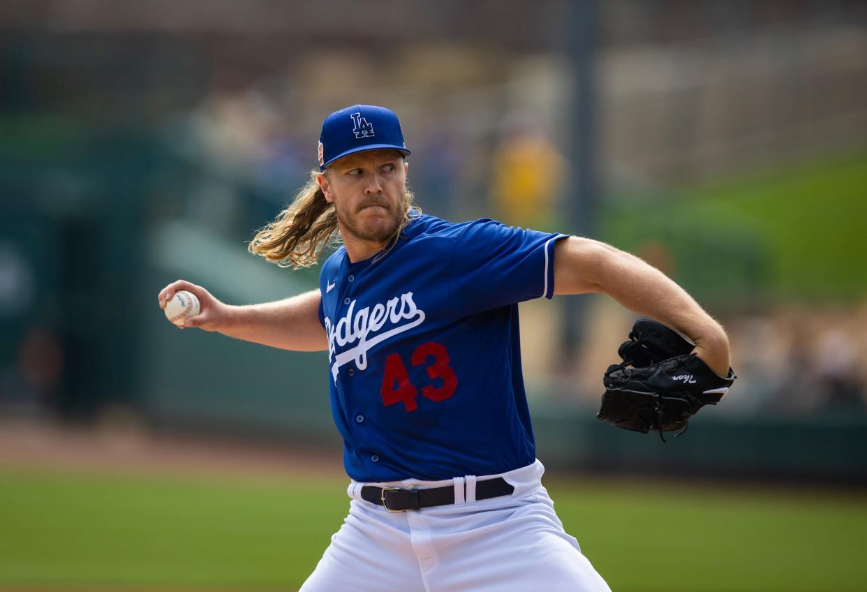 Noah Syndergaard pitches for the Los Angeles Dodgers.