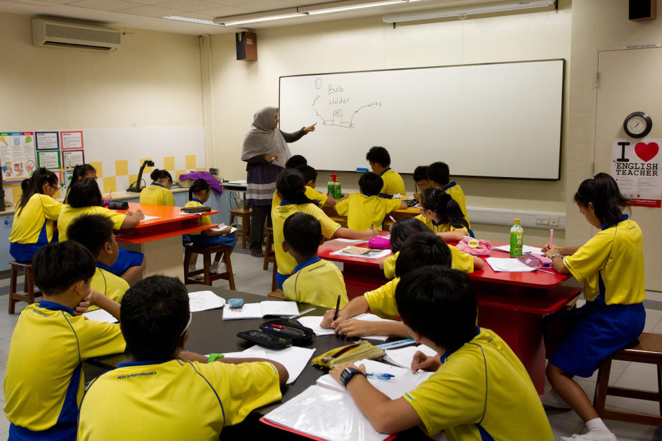 Punggol Primary School students during a science class. (FILE PHOTO: AP/Ray Chua)