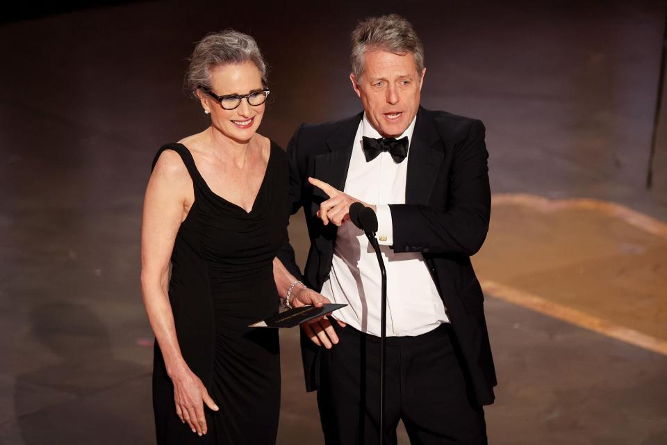 Andie MacDowell and Hugh Grant at the 95th Annual Academy Awards held at Dolby Theatre on March 12, 2023 in Los Angeles, California.