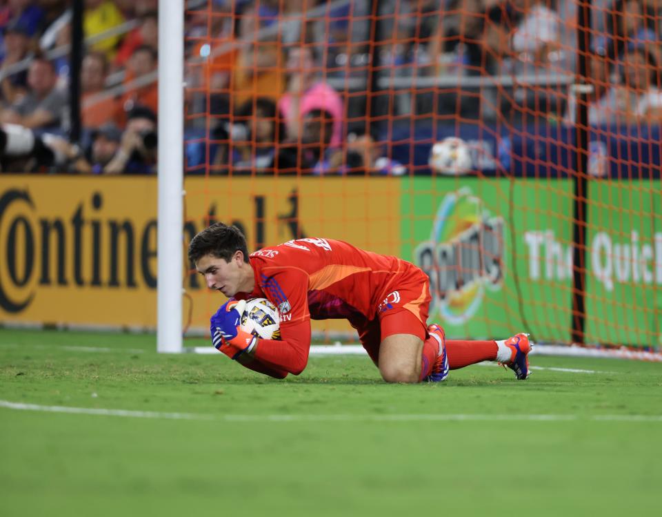 Sep 14, 2024; Cincinnati, Ohio, USA; Columbus Crew goalkeeper Patrick Schulte (28) saves a ball during the second half against FC Cincinnati at TQL Stadium. Mandatory Credit: Joseph Maiorana-Imagn Images