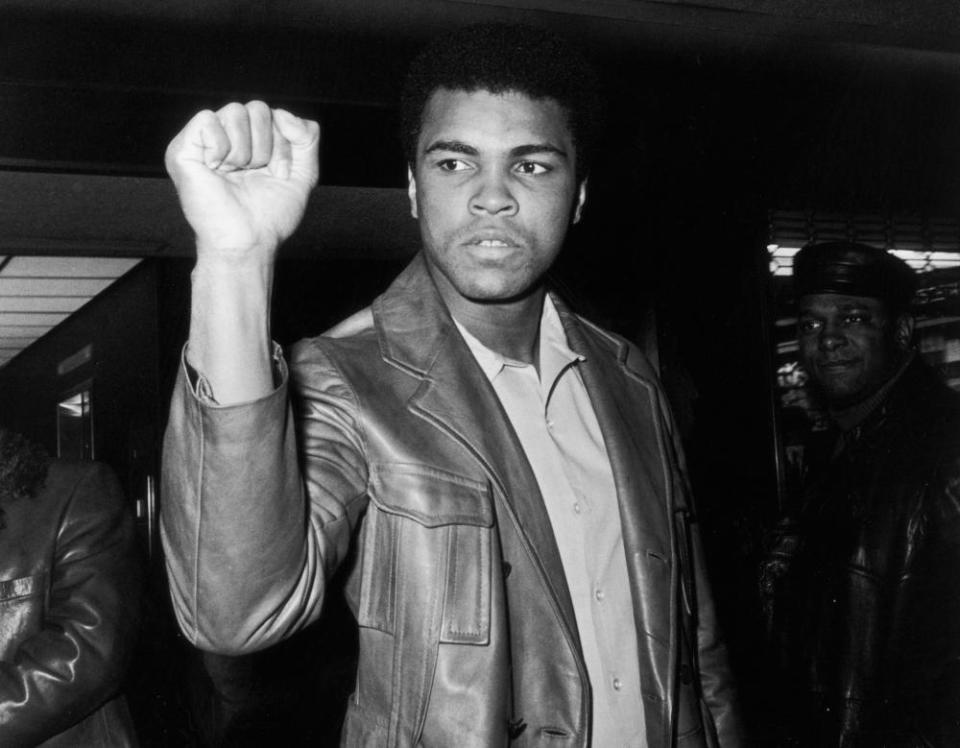 Muhammad Ali gives a Black Power salute in 1971