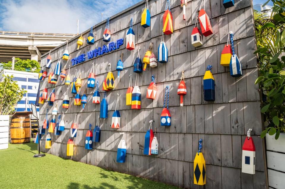 The colorful buoy wall at The Wharf Miami, which is closing.