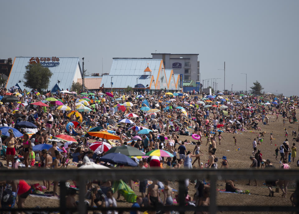 Large crowds gather at Southend beach as temperatures soar to as high as 34 degrees across the UK.