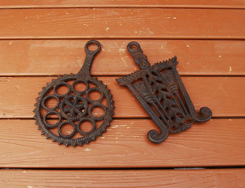 <p>Whether <a href="https://www.etsy.com/listing/504621615/set-of-2-trivets-vintage-cast-iron?ref=related-4" rel="nofollow noopener" target="_blank" data-ylk="slk:cast iron;elm:context_link;itc:0;sec:content-canvas" class="link ">cast iron</a> or wrought iron.</p>