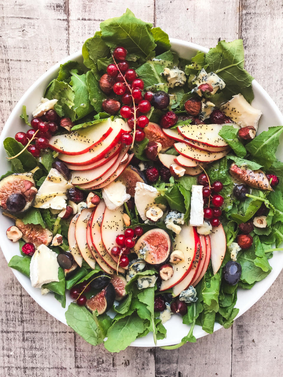 You want pears? Sure! How about cranberries? Gotcha covered. Figs? NO PROBLEM. Pomegranate too? Why not!!! And some grapes to top it off? Dig the eff in. Consider this the queen of fall salads. Recipe: Kale and Fall Fruit Salad with Cider Poppy Seed Dressing 