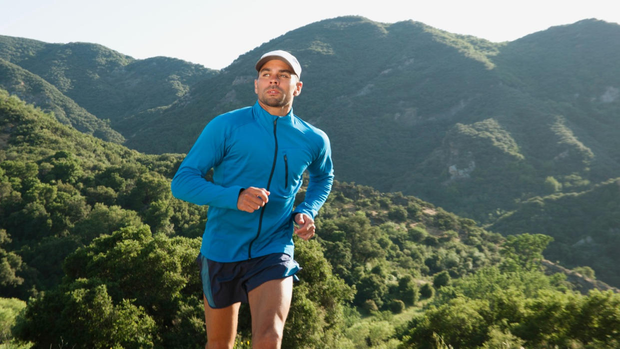  Man running in shorts 