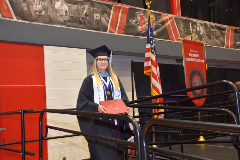 Haley Adams walks receives her Masters of Education degree at Nicholls State University, May 13.