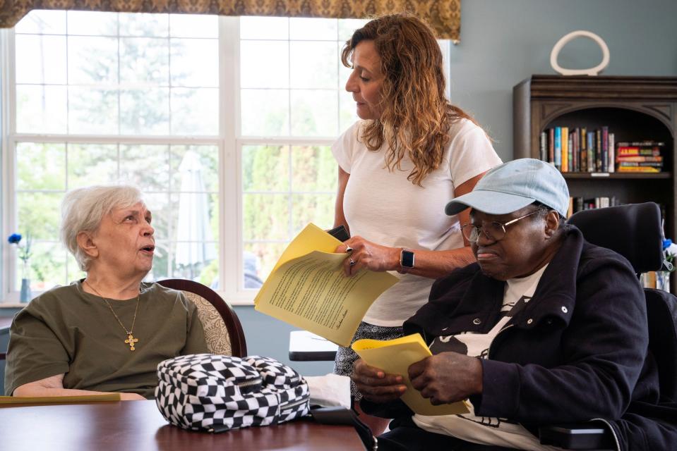 Janice Morehead, 77, left, and Peggy Posey, 71, right, talk with Deb Booth, 58, education coordinator of For the Love of Charlie cannabis company, about the benefits of cannabis at Baldwin House Senior Living in Hazel Park on Wednesday, August 9, 2023.