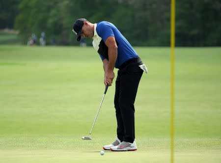 May 19, 2019; Bethpage, NY, USA; Brooks Koepka putts on the seventh green during the final round of the PGA Championship golf tournament at Bethpage State Park - Black Course. Mandatory Credit: Peter Casey-USA TODAY Sports