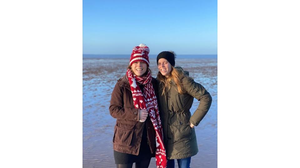 Eugenie and Beatrice smiling on beach in Norfolk at Christmas 2022