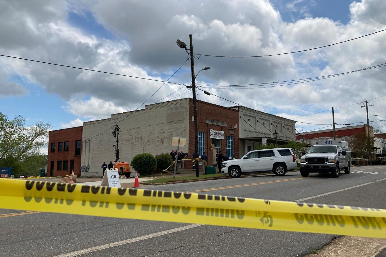 Investigators work the scene where several were killed on Saturday night, the Alabama Law Enforcement Agency confirmed (AP)