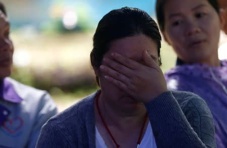 A family member cries near Tham Luang caves during a search for 12 members of an under-16 soccer team and their coach, in the northern province of Chiang Rai, Thailand, June 27, 2018. REUTERS/Soe Zeya Tun